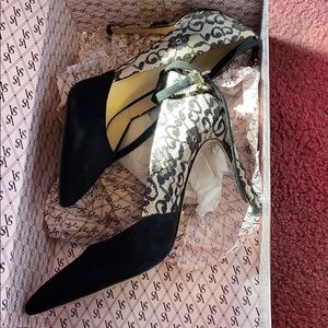 Black laced heels with box . Worn a couple times
